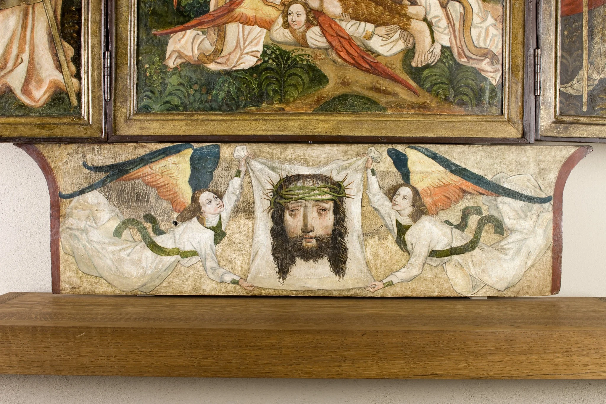 Veil of St. Veronica held by two angels. Altar retable from the church in Moszczenica Niżna – predella., detail