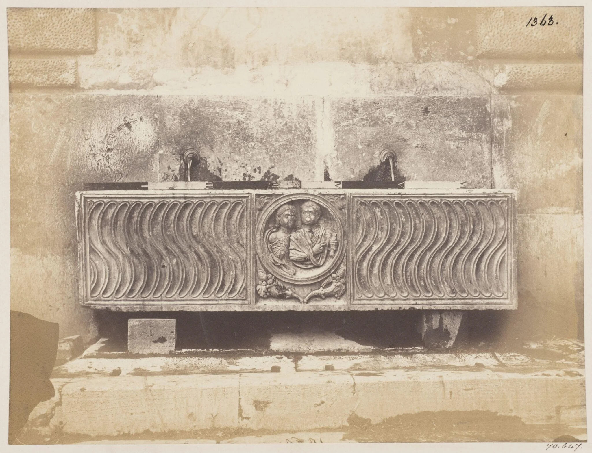Sculpture - Sarcophagus of the fourth century made into a fountain, near the Church of S. Maria, in the Piazza del Popolo, detail