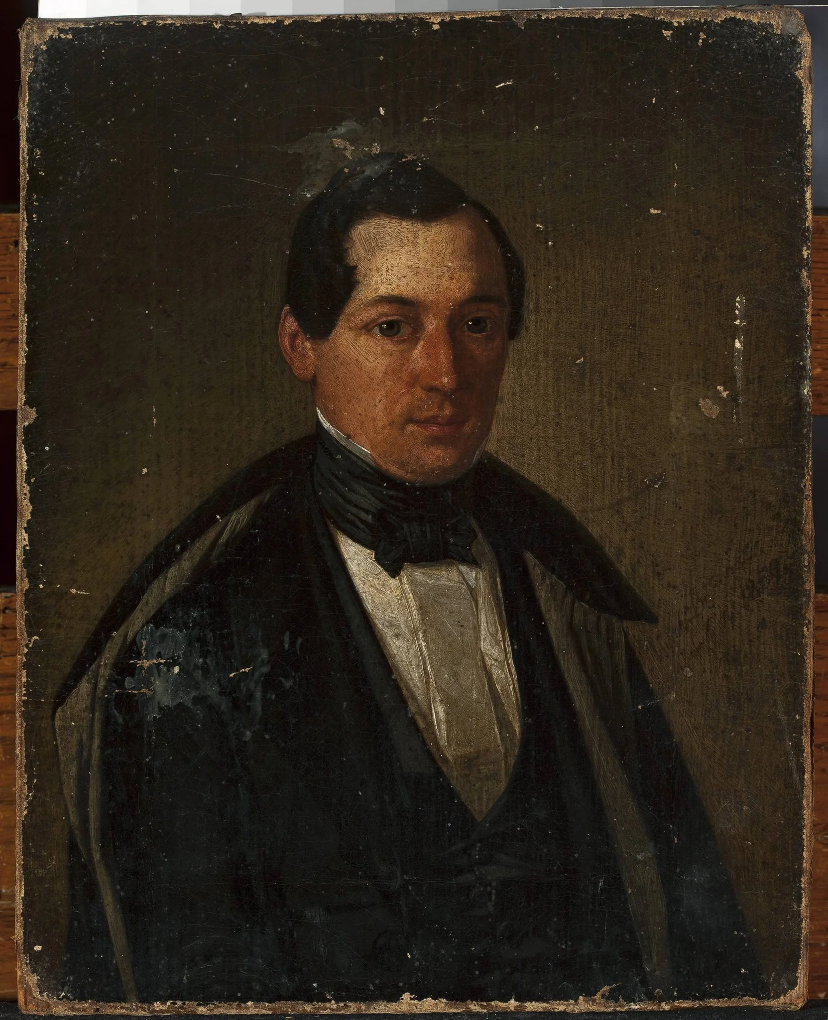 Portrait of a man in a coat, detail
