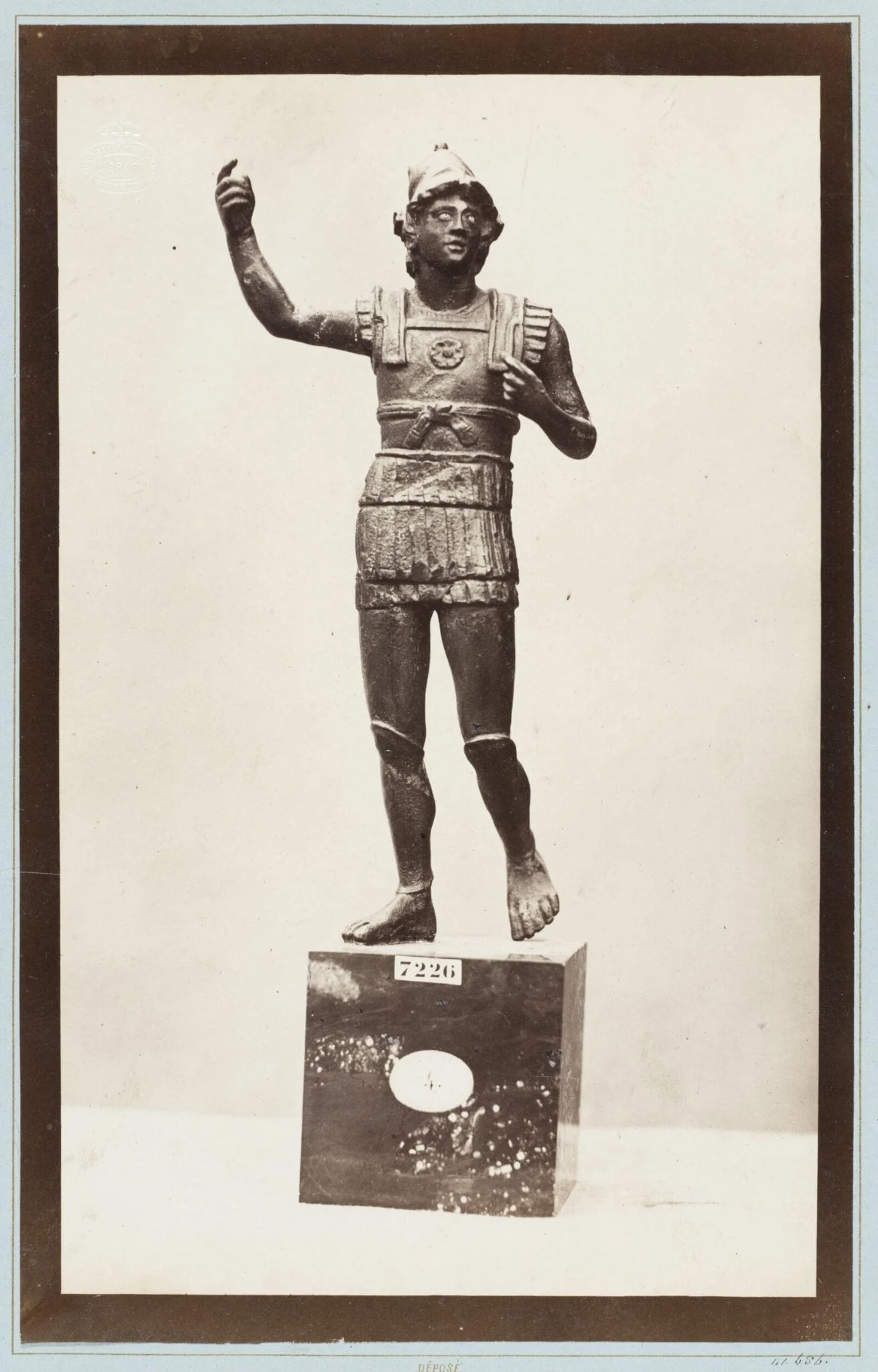 Bronze statuette, detail