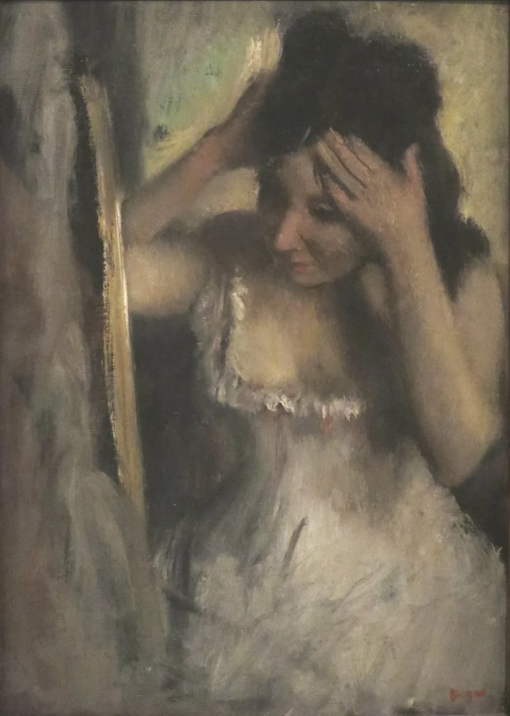 Woman Combing her Hair before a Mirror, by Edgar Degas, oil, 1889