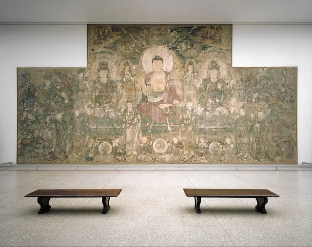 Buddha of Medicine Bhaishajyaguru (Yaoshi fo), a monumental temple wall painting from the Guangsheng temple complex in Shanxi.
