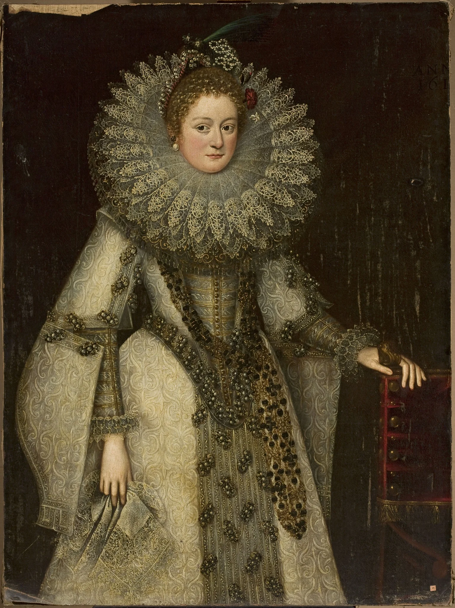 Portrait of a lady in a rich costume leaning on the armchair, detail