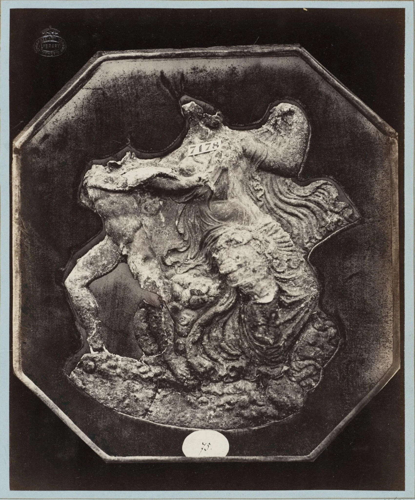 Antique bronze circular appliqué, detail