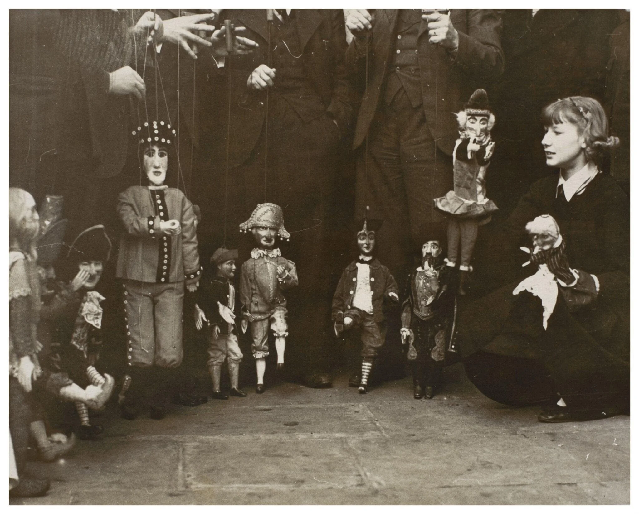 Photograph of puppeteers at the opening of the 13th Exhibition of the British Puppet and Model Theatre Guild, 1938, detail
