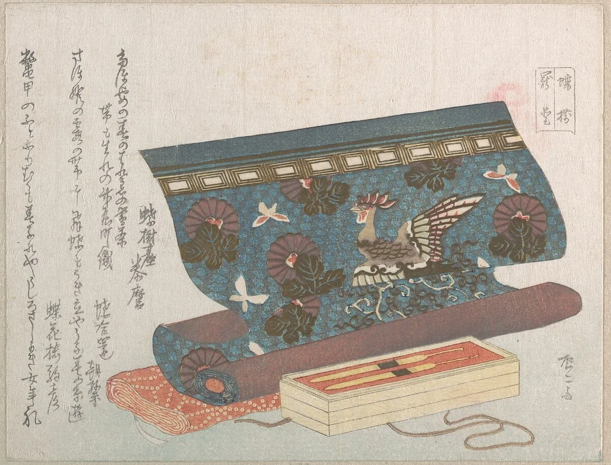 『蝶揃・寵愛』帯と簪|Roll of Cloth for an Obi and Tortoise-shell Hair Ornaments (“Presents for One’s Beloved”), from the Butterfly Series, from Spring Rain Surimono Album (Harusame surimono-jō, vol. 3), detail