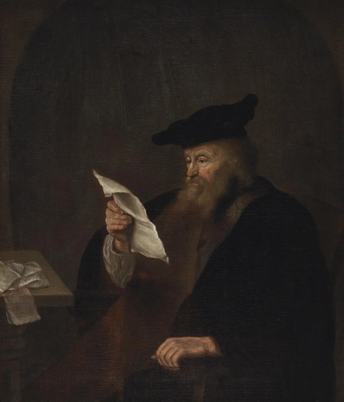 Scholar reading in study, detail