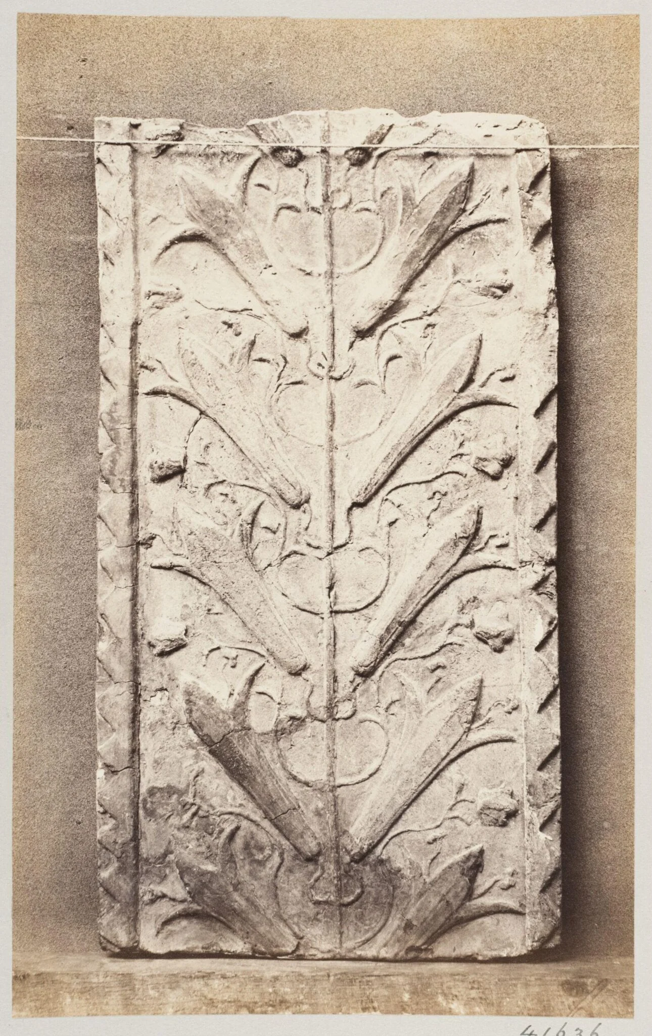Bas-relief portion of friez of fleur de lys in terra cotta, detail