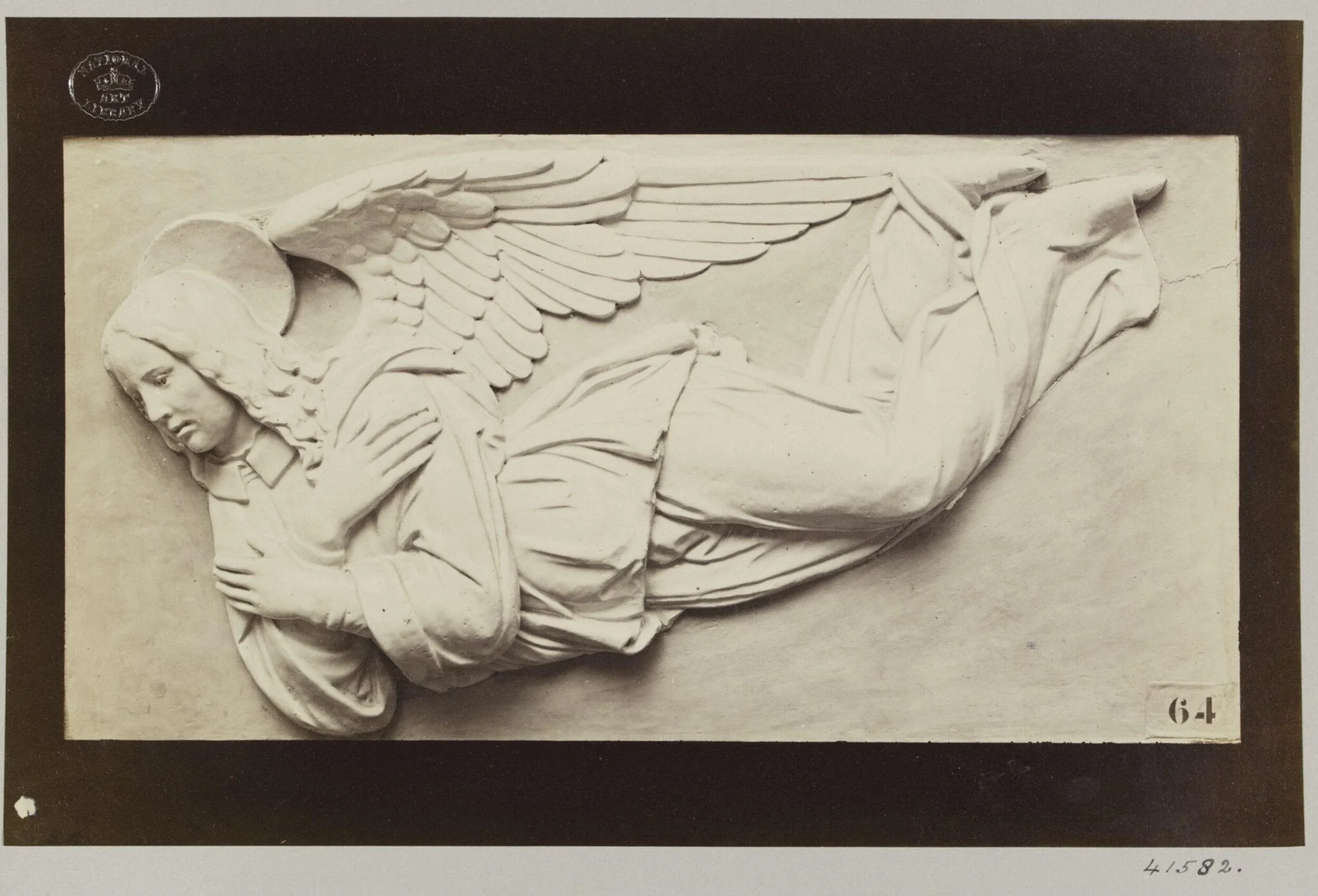 Bas-relief of enamelled flying angel, detail