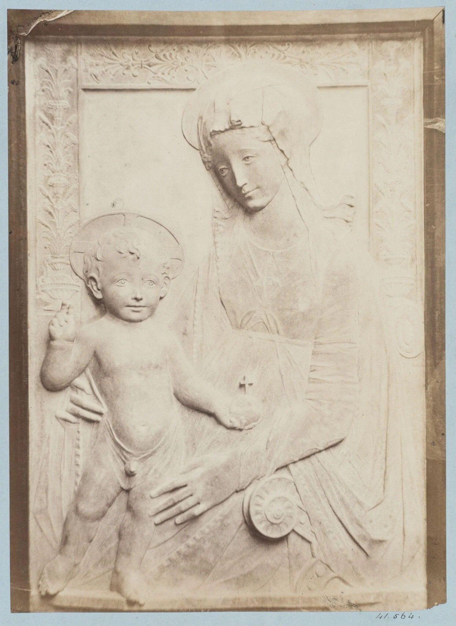 Bas-relief depicting the Virgin and Child attributed to Rosellino, detail
