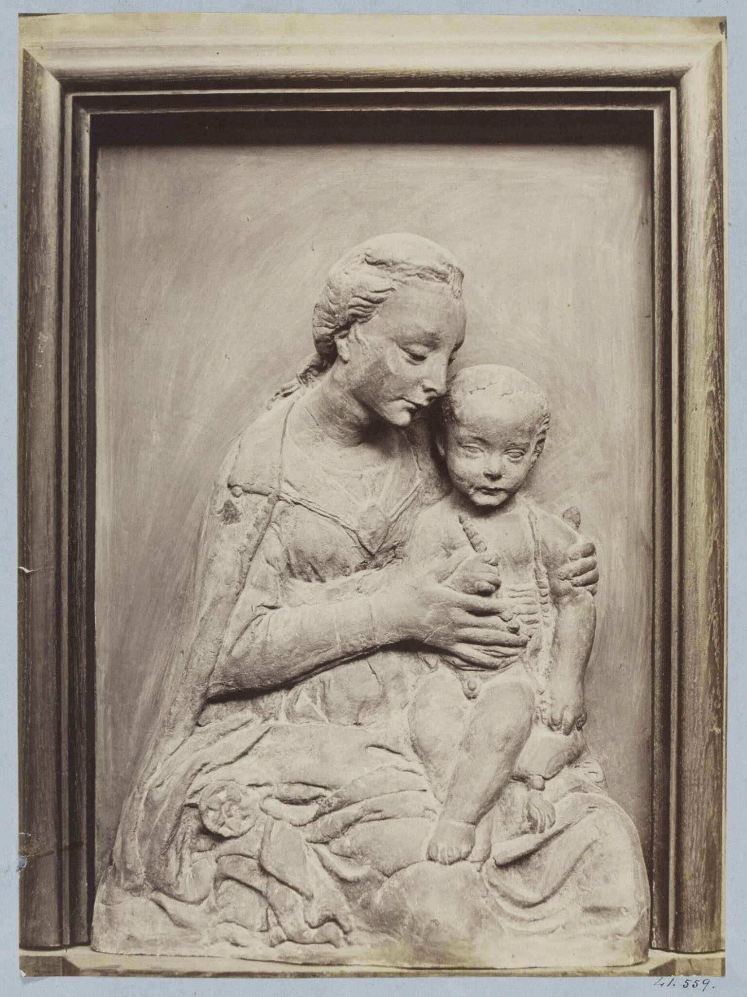 Bas-relief Virgin and Child in terra cotta of the school of Ghiberti, detail