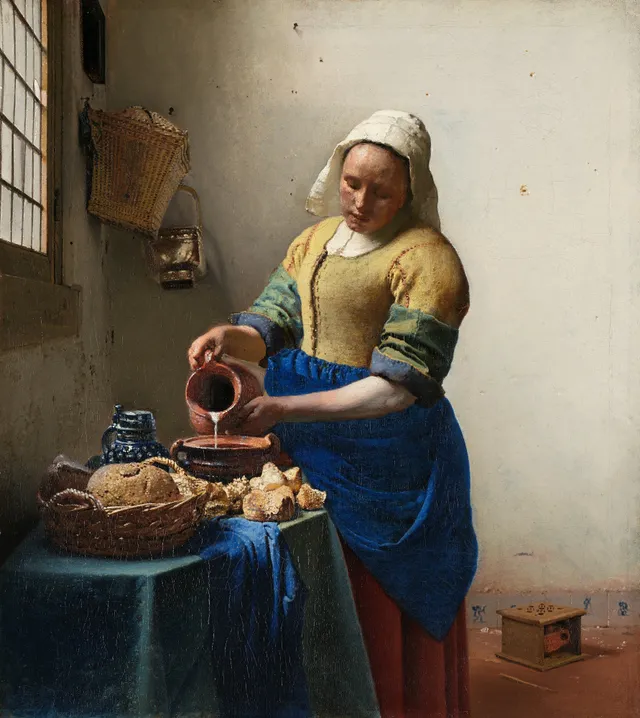 The Milkmaid, c. 1660. A servant pours a thin thread of milk into a bowl and looks at nothing but the task.