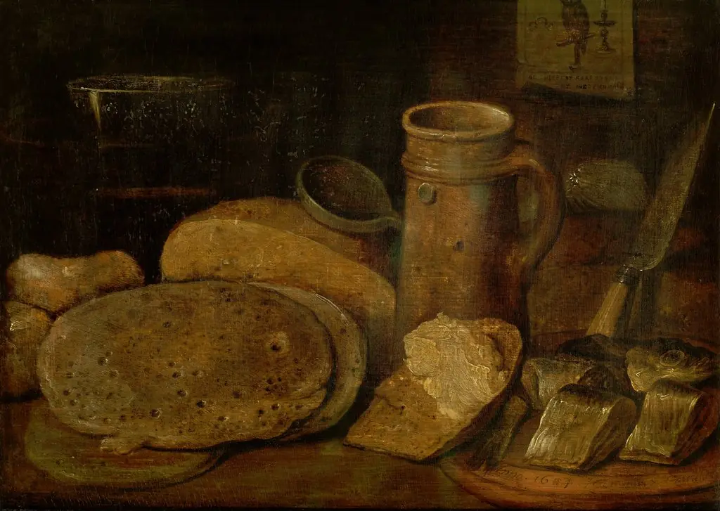 Still life with pottery, herring and pancakes, a print of an owl on the wall, by Hieronymous Francken II, oil, 1607