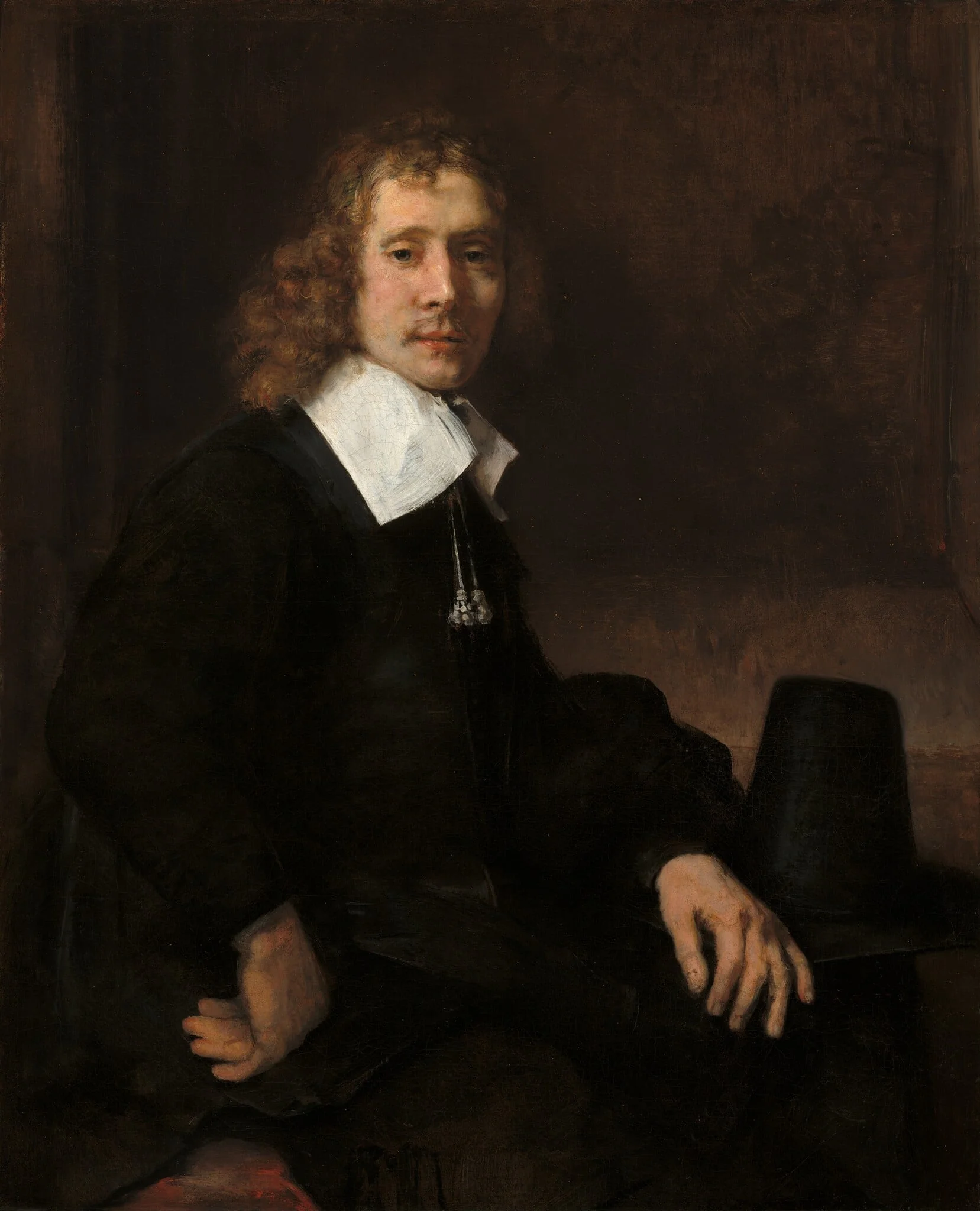 A Young Man Seated at a Table (possibly Govaert Flinck), detail