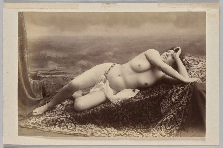 Untitled (reclining nude on carpet against painted backdrop of waves), detail