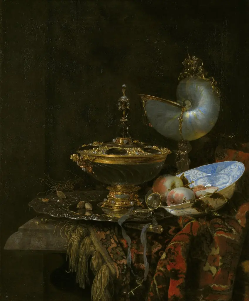 Pronk Still Life with Holbein Bowl, Nautilus Cup, Glass Goblet and Fruit Dish, by Willem Kalf, oil, 1690