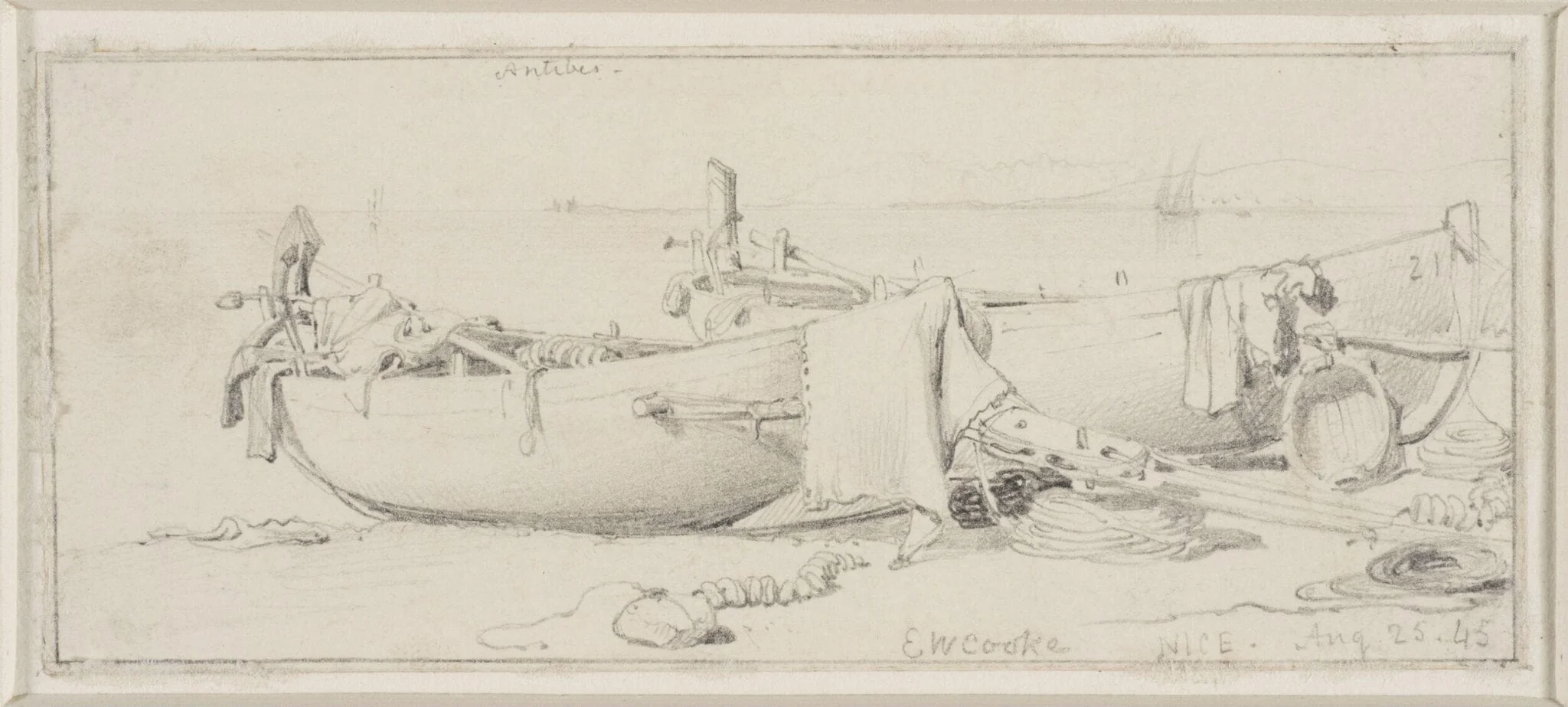 Fishing boats on the beach at Nice, with Antibes in the distance, detail