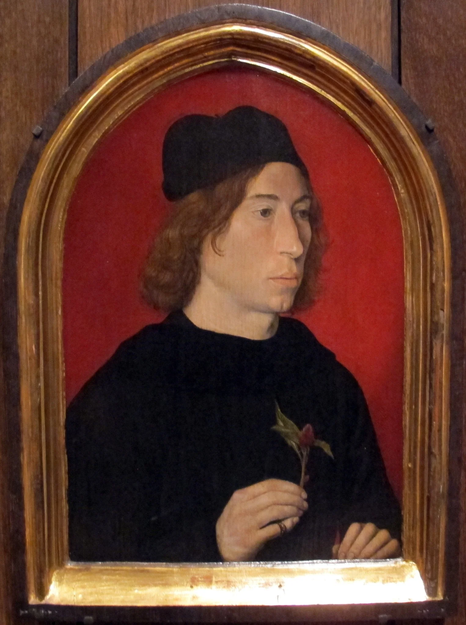 Portrait of a Young Man Holding a Sprig of Cockscomb, detail