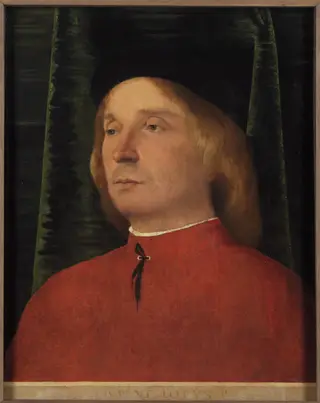 Portrait of a young man in red garment, by Lorenzo Lotto, unspecified, 1500