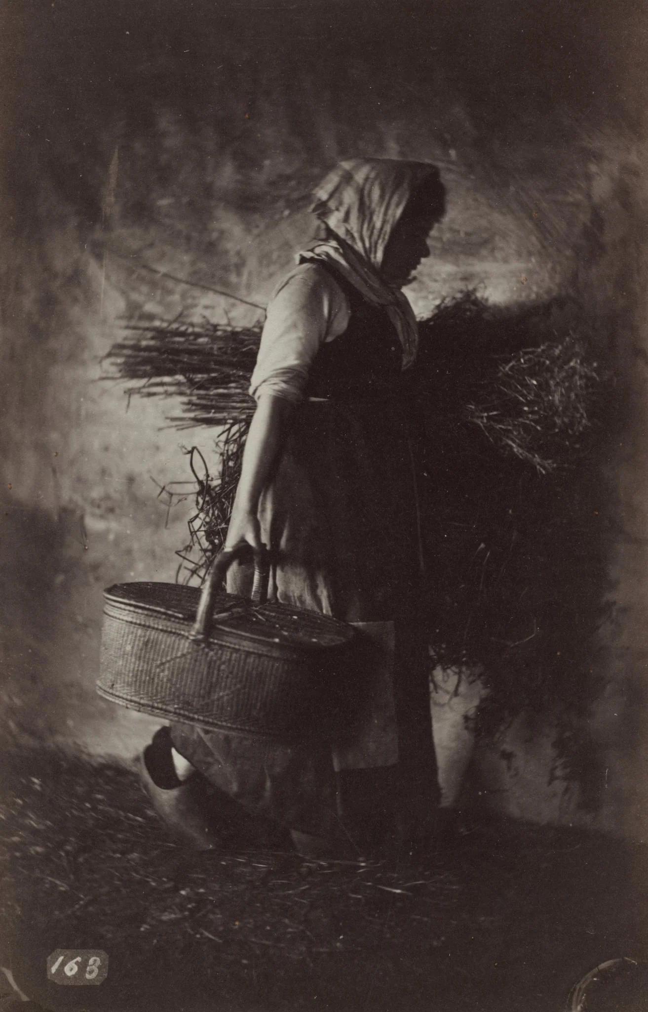 Female Peasant Carrying a Basket and Hay, detail