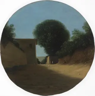 A country road by a house