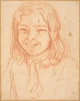 A Smiling Boy with Flowing Hair