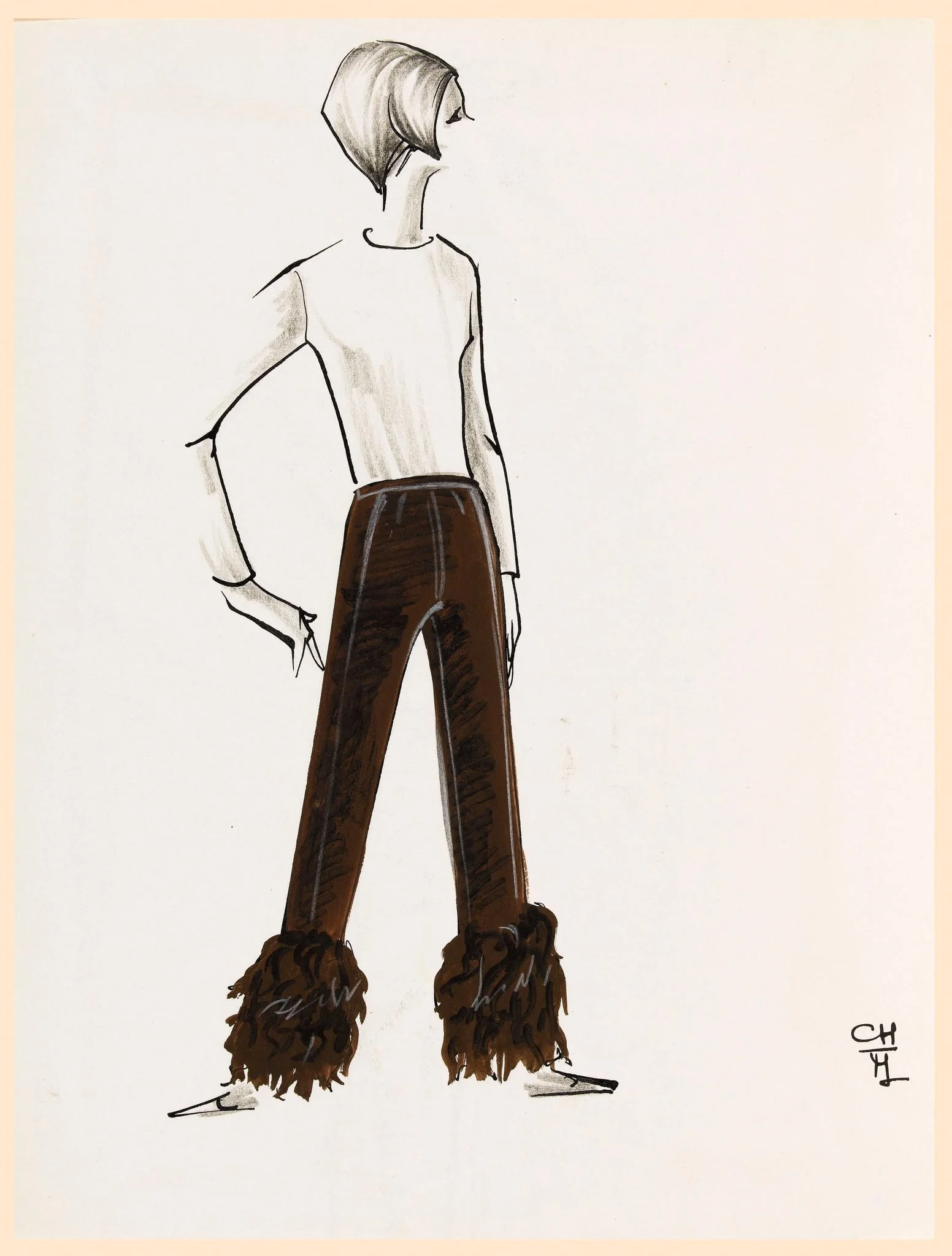 Pantalon marron avec fourrure de la même couleur au bas de la jambe, detail