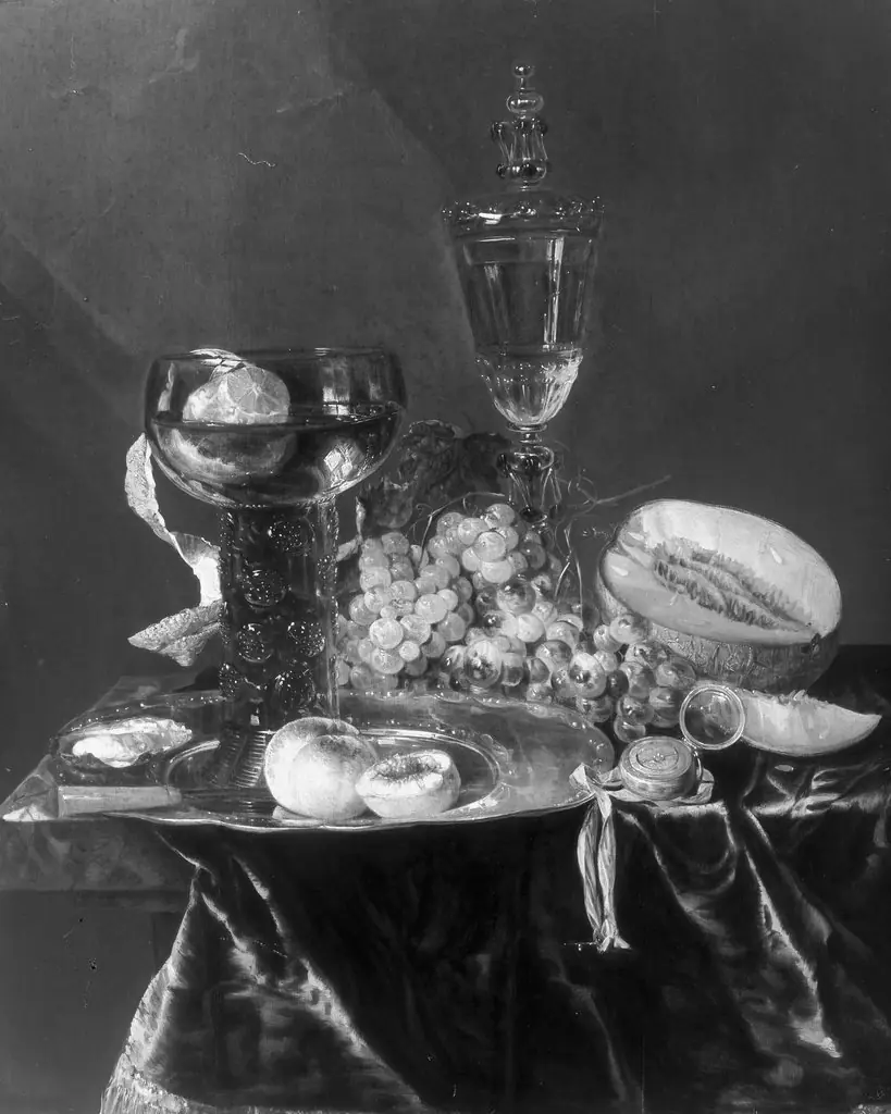 Still life with a glass lid goblet, by Abraham van Beijeren