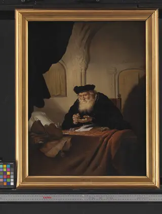 An Old Man Counting his Money