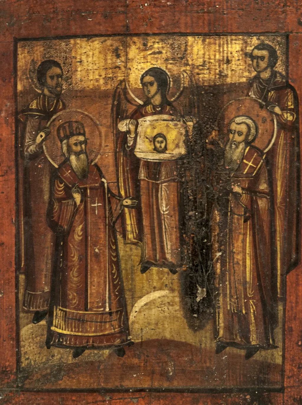 Sfânta Mahramă este, conform sfintei Tradiții, cea mai veche icoană a lui Hristos, nefăcută de mâna omului. Sfântul Ioan Damaschin(filozof, teolog și iconograf din sec VIII) descrie originea acesteia în Dogmatica ortodoxă: Se știe din tradiție că pe când Avgar era regele Edessei, a trimnis un pictor să picteze chipul Domnului, dar din pricină că pictorul nu a putut să -l picteze din cauza luminii strălucitoare a feței, Domnul Însuși , punând haina pe obrazul Lui dumnezeiesc și de viață făcător, s-a imprimat pe haină chipul Lui și astfel a trimis-o lui Avgar, care îl dorea. Deși inscripțiile nu mai ajută la identificarea exactă a momentului ilustrat, icoana ilustrează momentul în care sfânta Mahramă este adusă regelui Avgar. Un înger plasat în centrul compoziției arată mahrama cu chipul lui Iisus înconjurat de nimbul cruciger. De o parte și de alta, plasați simetric, un episcop și un preot în vârstă, binecuvântând, în spatele lor regele, în pandant un personaj fără nimb, toți privind către chipul lui Hristos imprimat pe țesătură. Conform unei legende, chipul lui Hristos s-a imprimat și pe mahrama cu care Veronica i-a șters chipul în timpul patimilor. Compoziția este narativă, echilibrată, chipurile expresive. Cromatica specifică icoanelor de tip krasnushka, tonuri de pământ în combinație cu fondul foiței aurii(fond -1/4 superior). Bordura brun roșcată, lată, delimitat prin linii negre.Icoana prezintă urme de arsură., by anonim