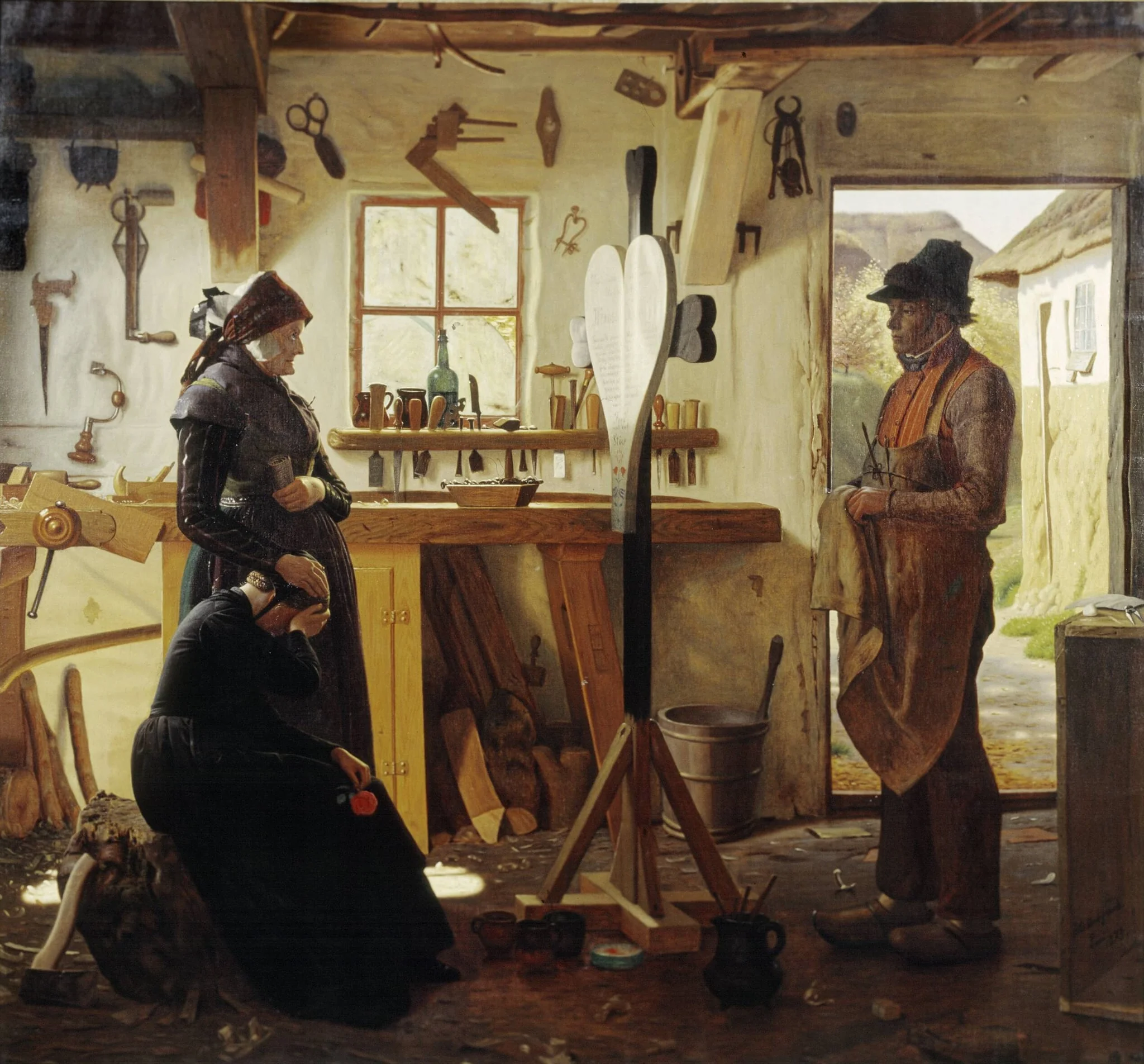 To kvinder besøger landsbykunstneren for at se det bestilte gravkors, detail