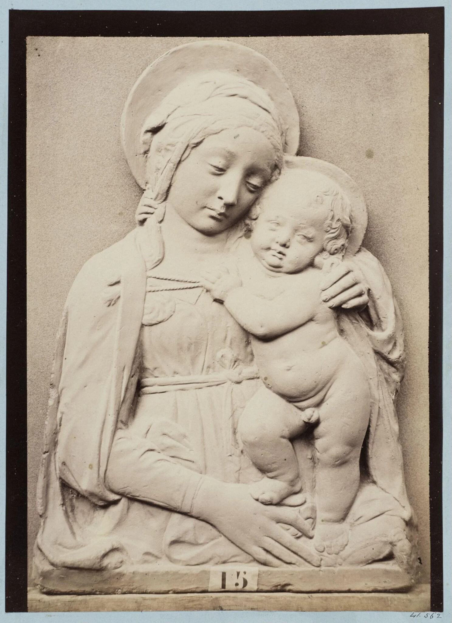 Bas-relief depicting the Virgin and Child by Donatello in red terra cotta, detail