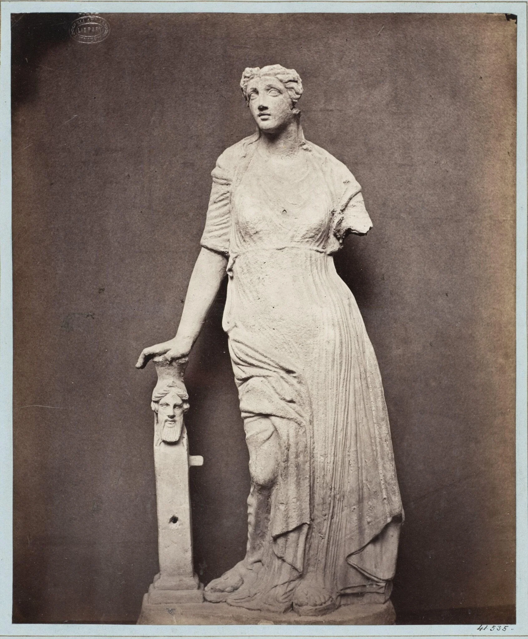 Venus leaning on a bearded Herma statuette in terra cotta, detail