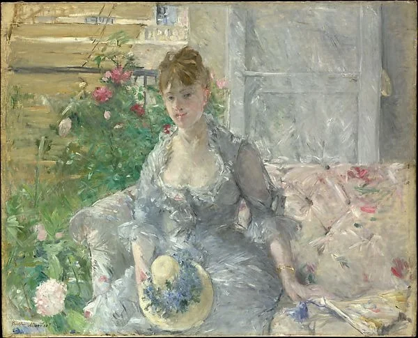 Young Woman Seated on a Sofa, detail