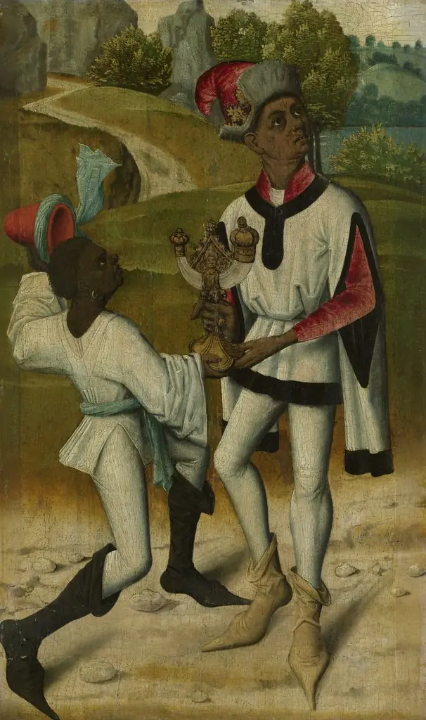 Balthazar, one of the three Magi, with a servant