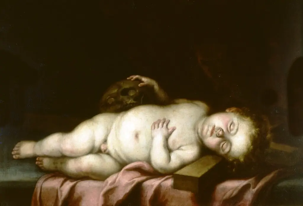 El Niño Jesús dormido sobre la Cruz