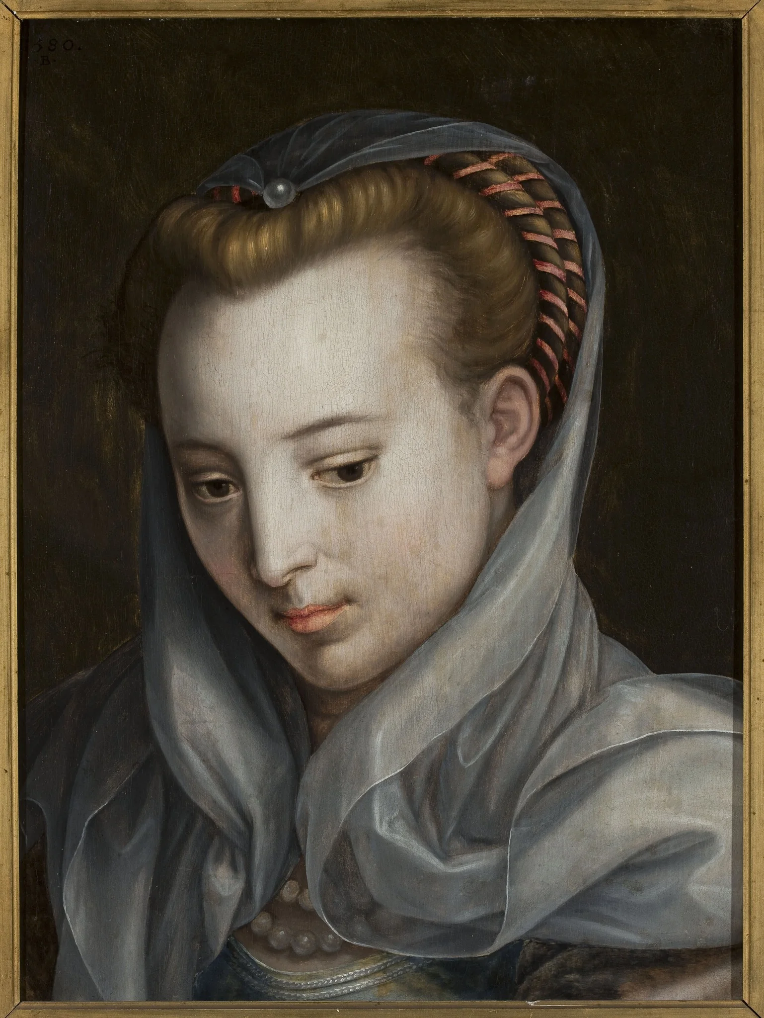 Head of a woman looking down to the right, detail