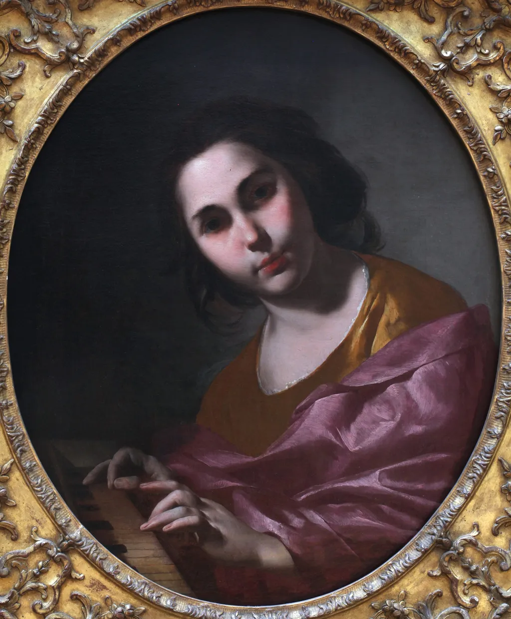 Woman Playing the Clavichord, by Bernardo Cavallino, oil, 1650