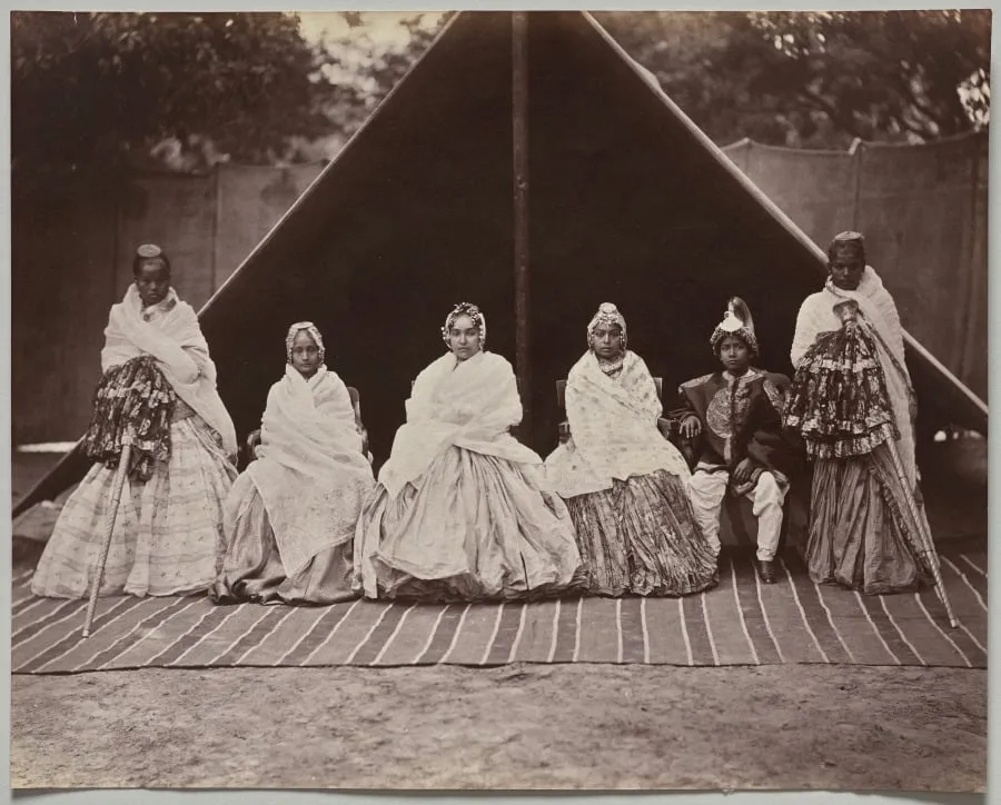Three of Sri Tung Bahadur's Favorite Wives and His Youngest Son, by Bourne & Shepherd, 1870