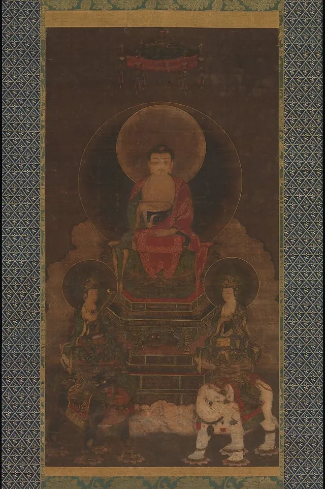 Shaka (Shakyamuni) Triad, a Buddhist hanging scroll of the central Buddha flanked by two bodhisattvas, ink, color, and gold on silk.