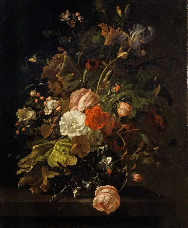 Flowers in a glass vase, on a stone table, detail