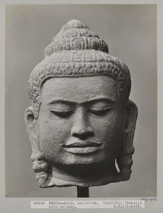 Cambodian Bayon style sandstone sculpture of head of Buddha, 10th century A.D., V&A Museum, London
