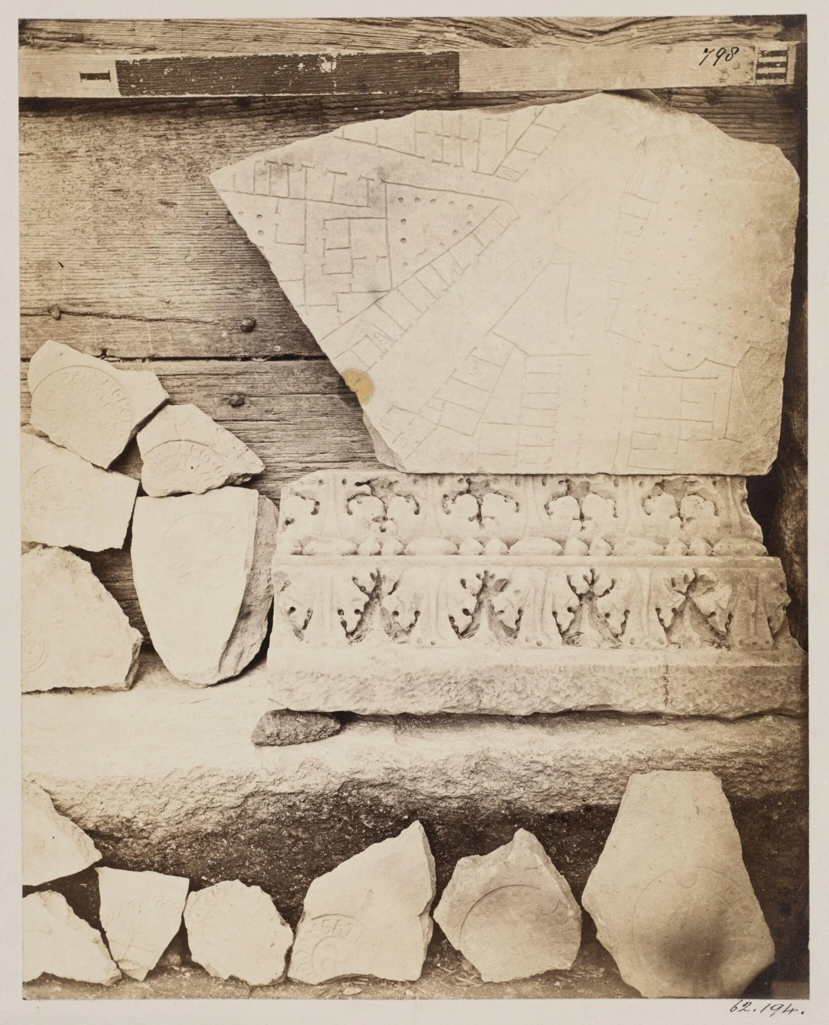 Sculptures - Cornice and Tiles of the third century, found with the fragments of the Marble Plan in 1867, at SS. Cosmas and Damian., detail