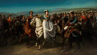 Isabel II y su Estado Mayor a caballo