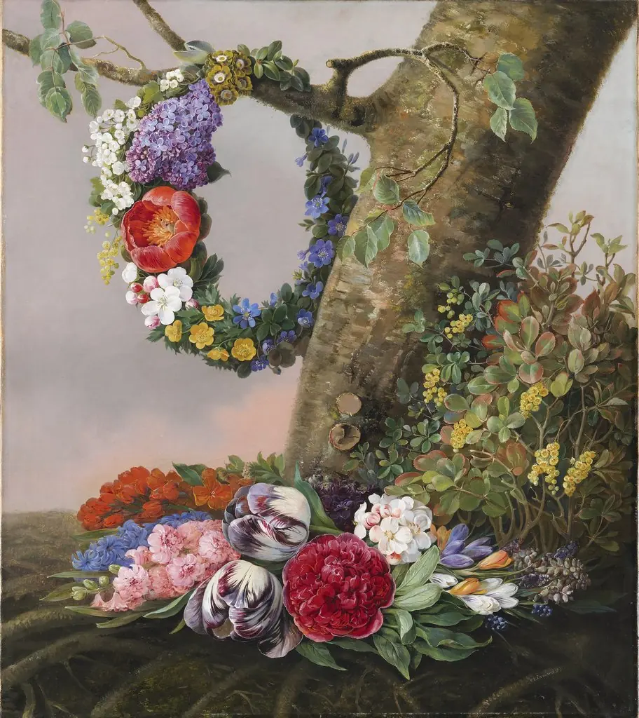 A bouquet of flowers at the foot of a tree. At a branch hangs a garland, by Christine Løvmand