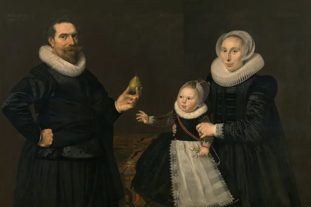 Portrait of a 43-year old man with wife and child