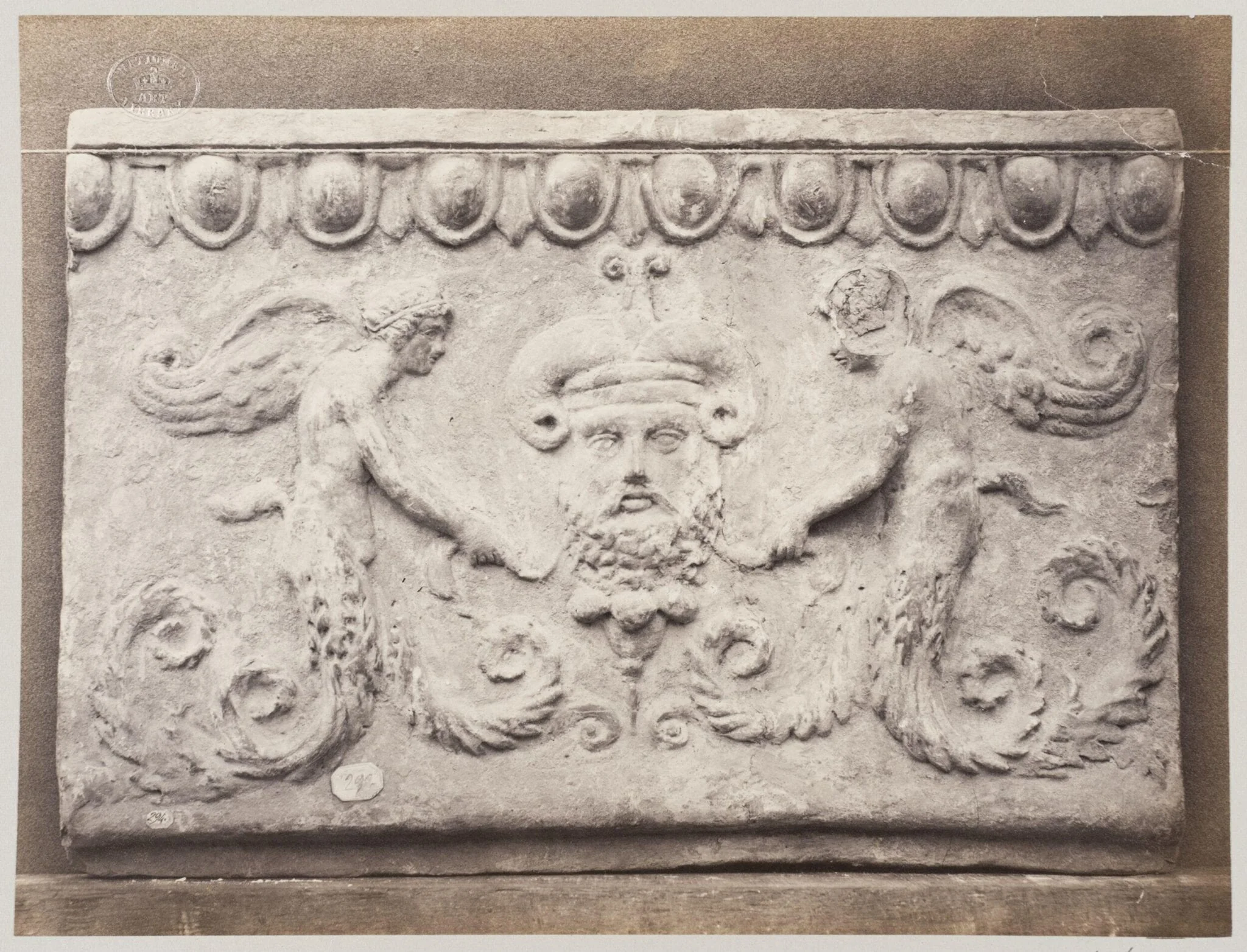 Bas-relief portion of frieze of masque of Ammon and genii in terra cotta, detail