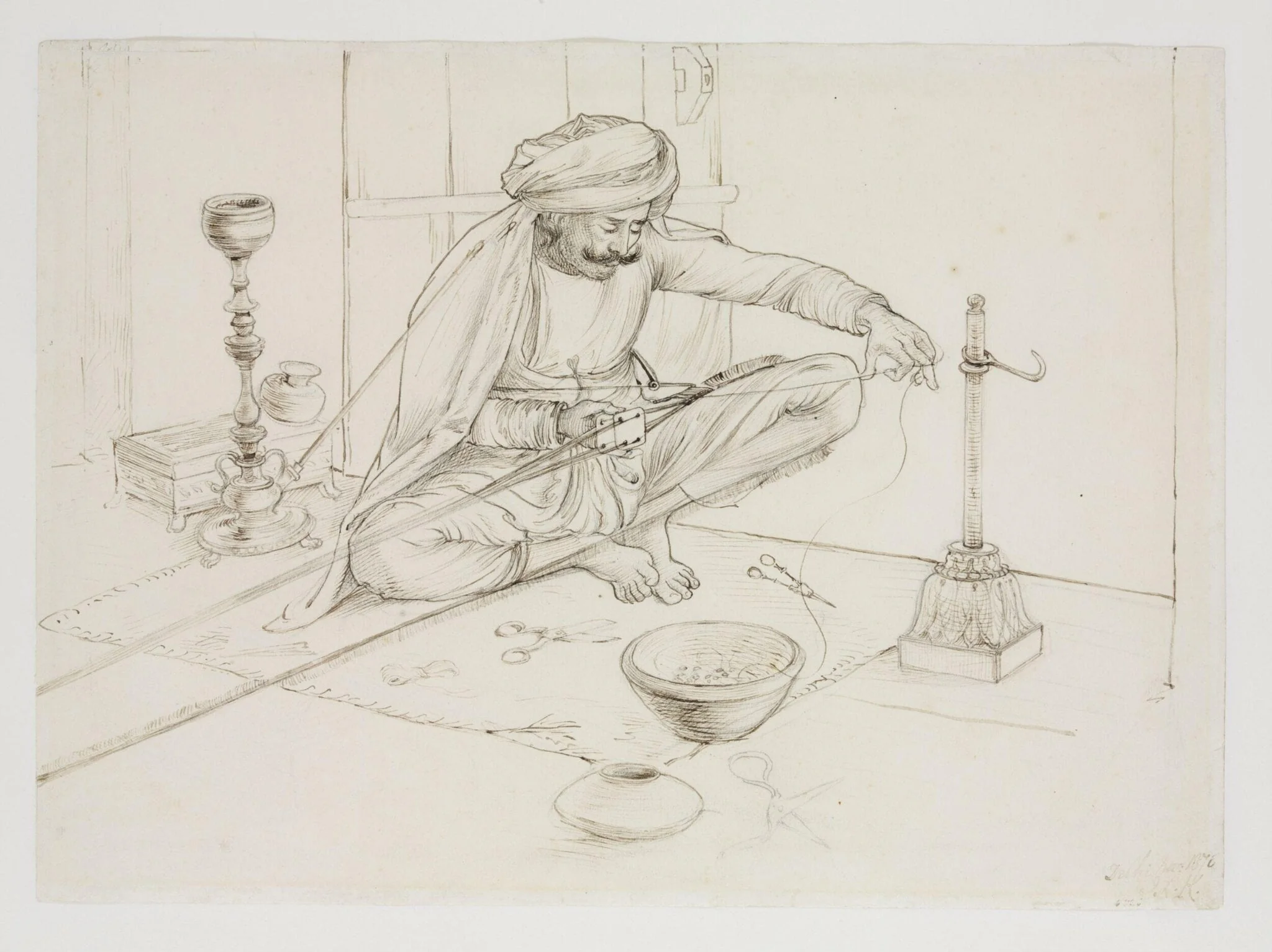 A man making a gold fringe, detail