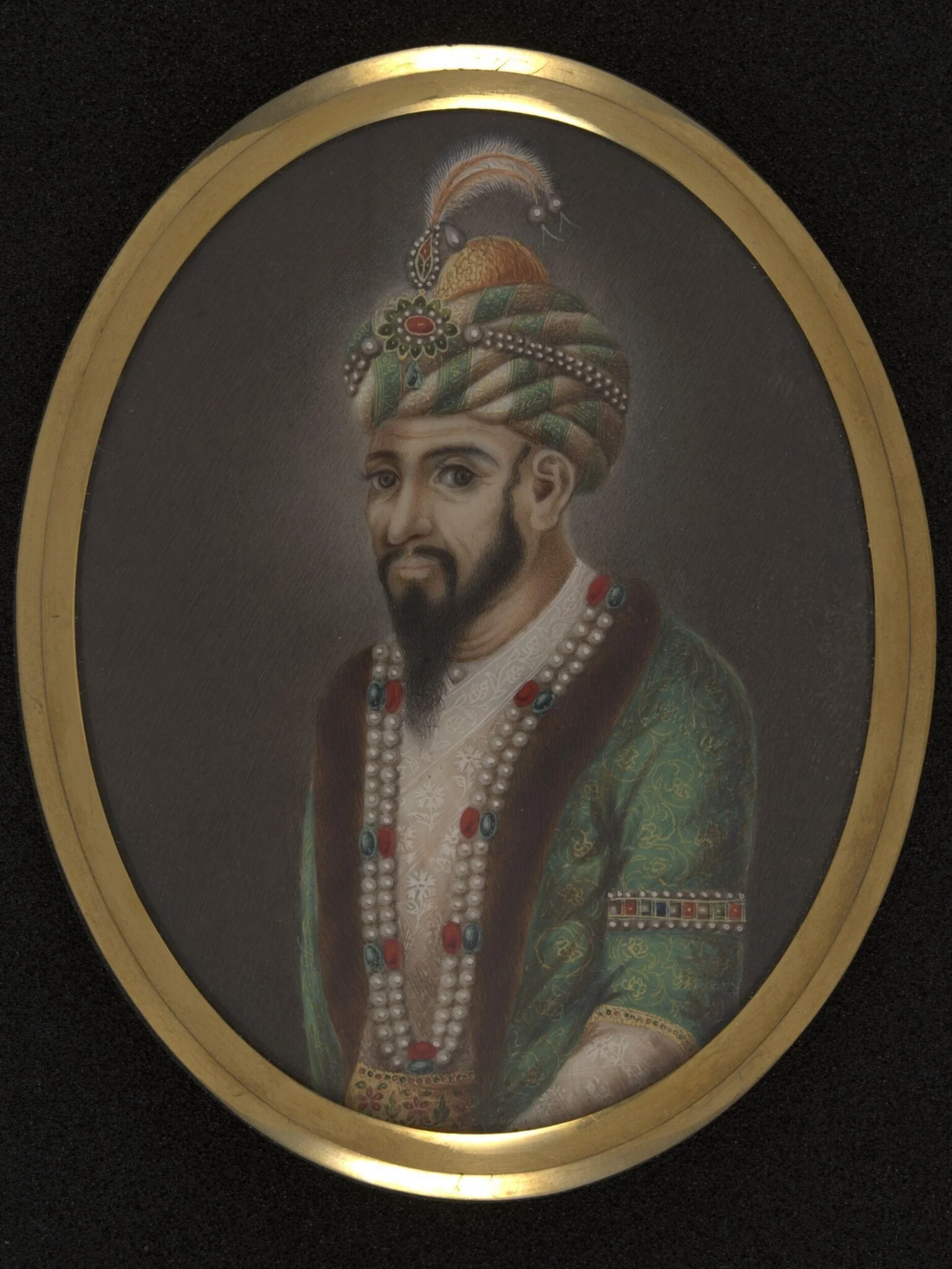 One of twelve miniatures depicting Mughal rulers of India; head and shoulders in profile., detail