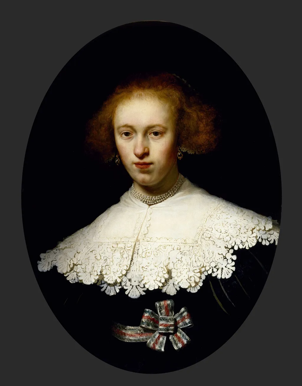 Portrait of a Young Woman (formerly seen as oval portrait of Oopjen Coppit), by Rembrandt van Rijn, oil, 1633